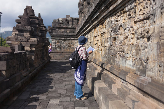 Tourists visit the Borobudur Temple in Magelang, Central Java, Indonesia