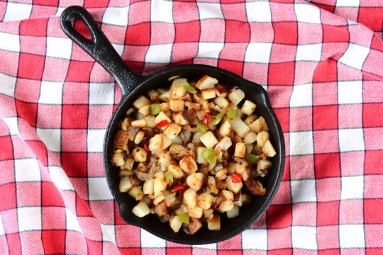 Potatoes Obrien in Skillet on Red Checked Table Cloth