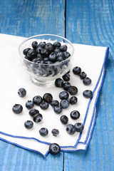 Blueberries on Napkin and Blue Table