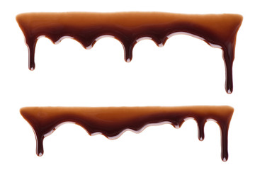 Flowing chocolate drops / Melted chocolate dripping set on white background