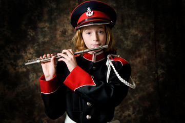 girl in a marching band uniform with a flute