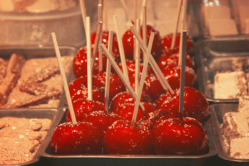 Candy apples on a fair stand 