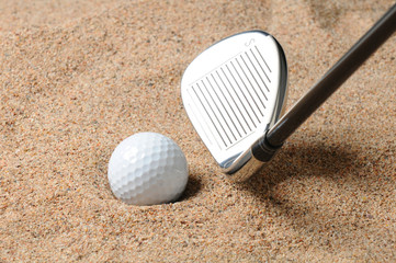 Golf Ball in Sand Trap