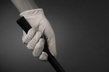 Closeup of a Golfers Gloved Hand on Club