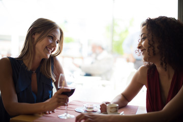 Fototapeta premium Woman at coffe shop table