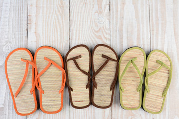 Beach Sandals on Wood Deck