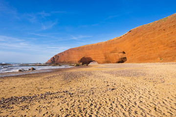 Fototapeta na wymiar Orange arch on Legzira beach, Morocco