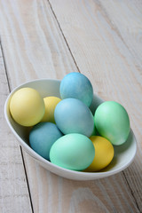 Pastel Easter Eggs in a Bowl Vertical