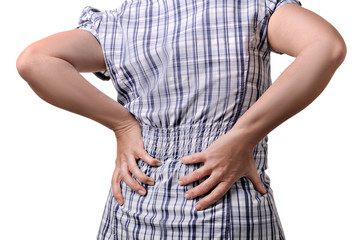 woman holding hands to his aching back