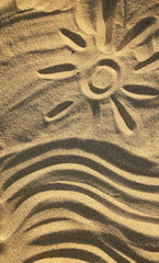 Fototapeta na wymiar relief background waves of sand on the beach