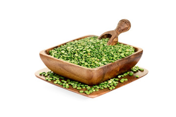 Dry raw organic chickpeas in wooden bowl with wooden scoop