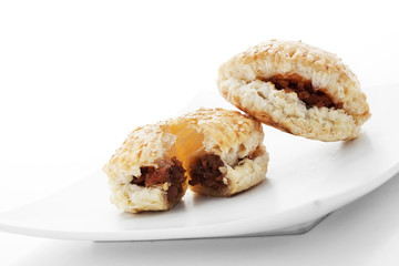 Baked Crisp Roasted Pork pies on plate