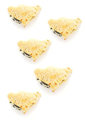 Spinach pie puff on background,top view