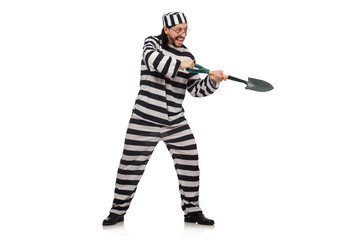 Prison inmate with spade isolated on white