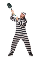 Prison inmate with spade isolated on white