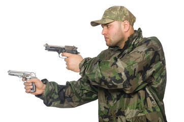 Fototapeta premium Solider holding gun isolated on white