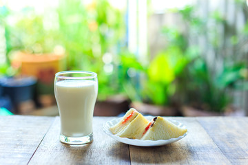 Glass of milk ,breakfast On a wooden table