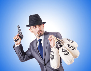 Businessman criminal with sacks of money