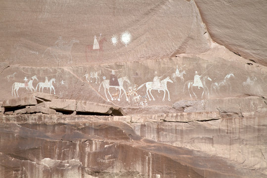 Precolumbian pictograph showing Spanish invaders in Canyon de Chelly National Monument in Arizona