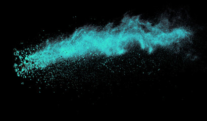 Launched colorful powder, isolated on black background
