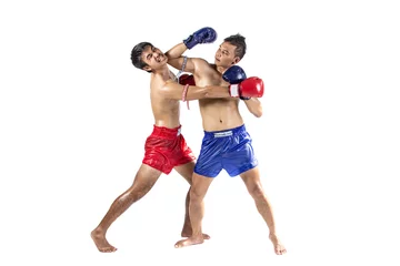 Papier Peint photo Arts martiaux Two thai boxers exercising traditional martial art