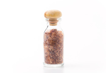 spessartine in glass bottle isolated