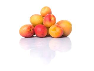 Ripe apricot over white background