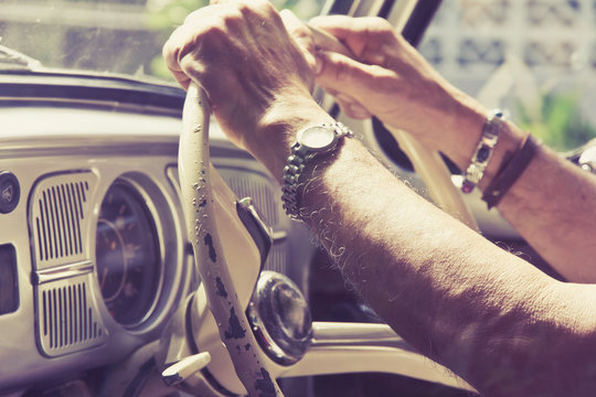 Older Man Driving A Car