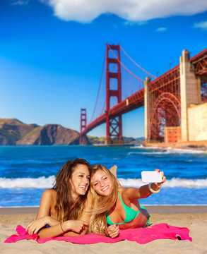 happy girl friends selfie portrait beach sand