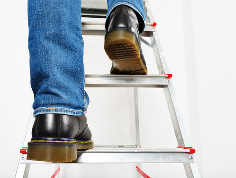 Man on ladder.