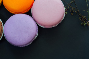 Macarons on black with copy space, Vintage tone
