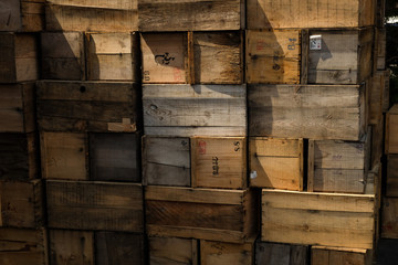 Crates stack. weathered wooden boxes background.