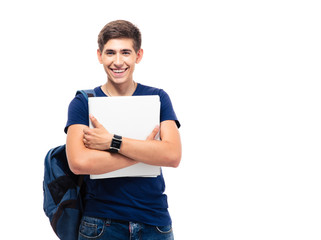 Smiling male student with backpack holding folders