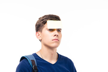 Closeup portrait of a man with sticker on forehead
