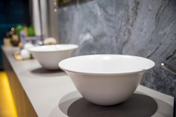 Modern faucet and wash basin in luxury bathroom 