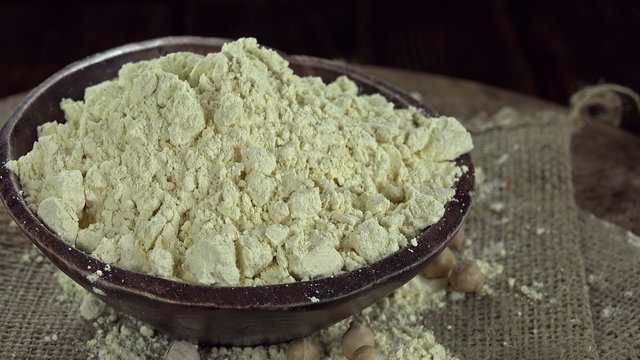 Portion of Chick Pea Flour (seamless loopable 4K UHD footage)