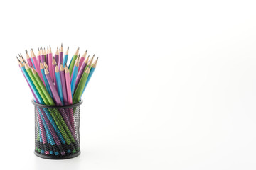 black bucket in office with colorful pencil