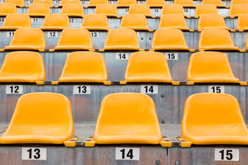 orange stadium seats tilt