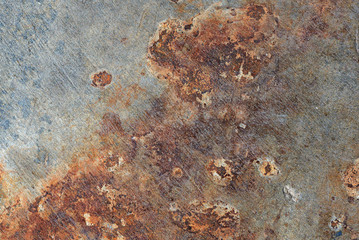 Brown grunge rust stains on polished old grey concrete floor