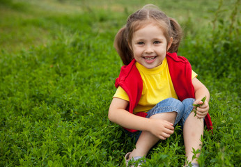 Little girl in meadow