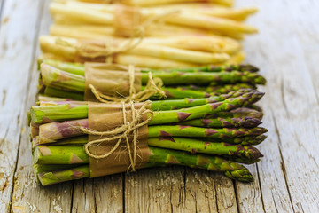 Asparagus - bunches of white and green asparagus