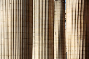 Classical columns at the front of the pantheon in Paris