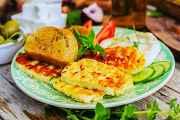 Greek cuisine dishes - Greek salad, choriatiki, halloumi