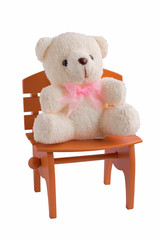 Fluffy teddy bear isolated on white