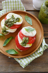 Bruschetta with mozzarella and pesto