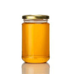 Tuinposter honey jar on white background © Ivaylo
