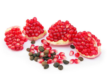 sliced pomegranate with coffee grains and pomegranate grains