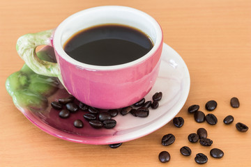 Black coffee on the wooden table