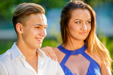 Fototapeta premium beautiful young couple in park in a summer day