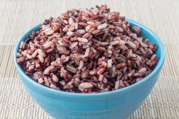 steamed rice in blue round bowl